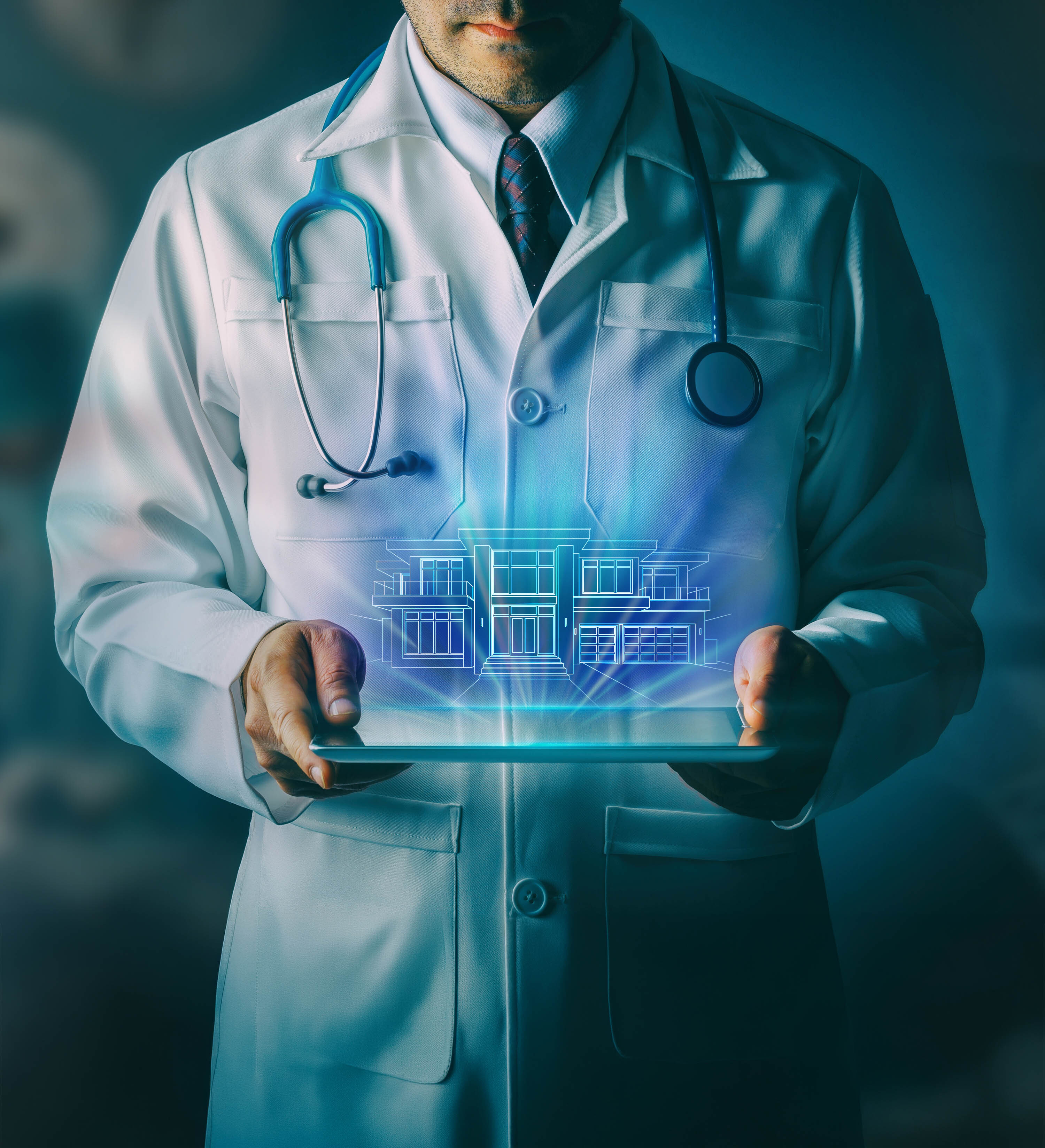 Doctor viewing architectural plans on tablet